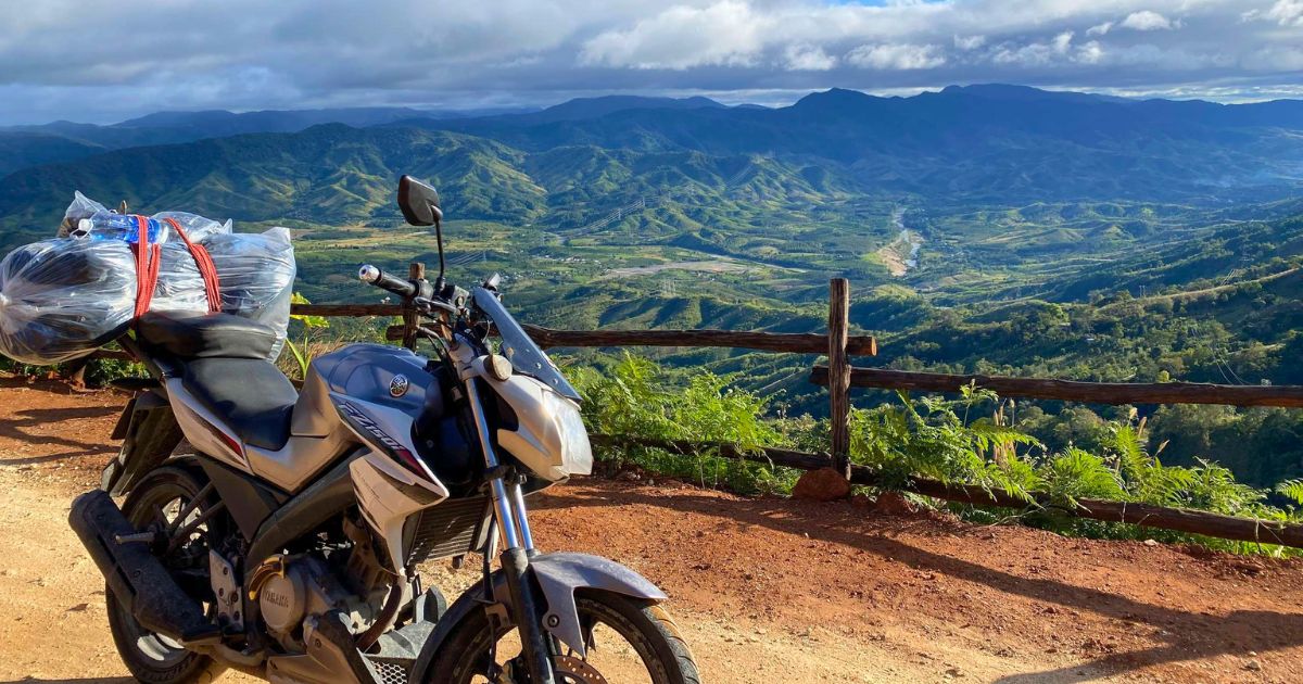 Easy Rider guide riding through Vietnam's Central Highlands on a 6-day motorbike tour